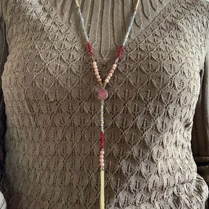 Adjustable pink, gray and red gem stone drop necklace with gold tassel